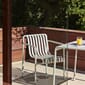 812005-1_Rel Palissade_Dining_Armchair_Palissade_Table_sky_grey.jpg