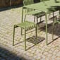 812055_Rel PC Portable olive_Palissade Table_Palissade Armchair_Palissade Ottoman_olive.jpg