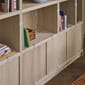 stacked-bookcase-1-oak-relevo-rug-burnt-orange-kink-vase-light-blue-muuto-org.jpg
