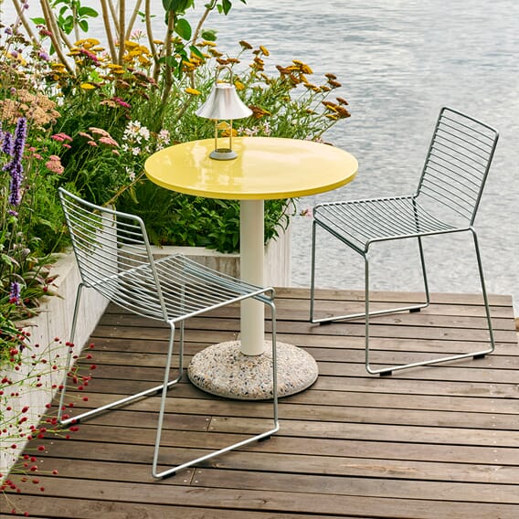 Hee_Chair_hot_galvanised_Ceramic_Table_dia70xH74_bright_yellow_tabletop_cream_white_tube_concrete_base.jpg