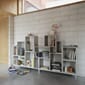 stacked-bookcase-3-grey-post-table-brown-green-ridge-vase-muuto-org.jpg