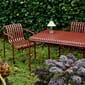 PAL6_Rel Palissade_Dining_Armchair_iron_red_Palissade_Table_L170xW90xH75_iron_red_Mousqueton_Portable_oyster_white.jpg